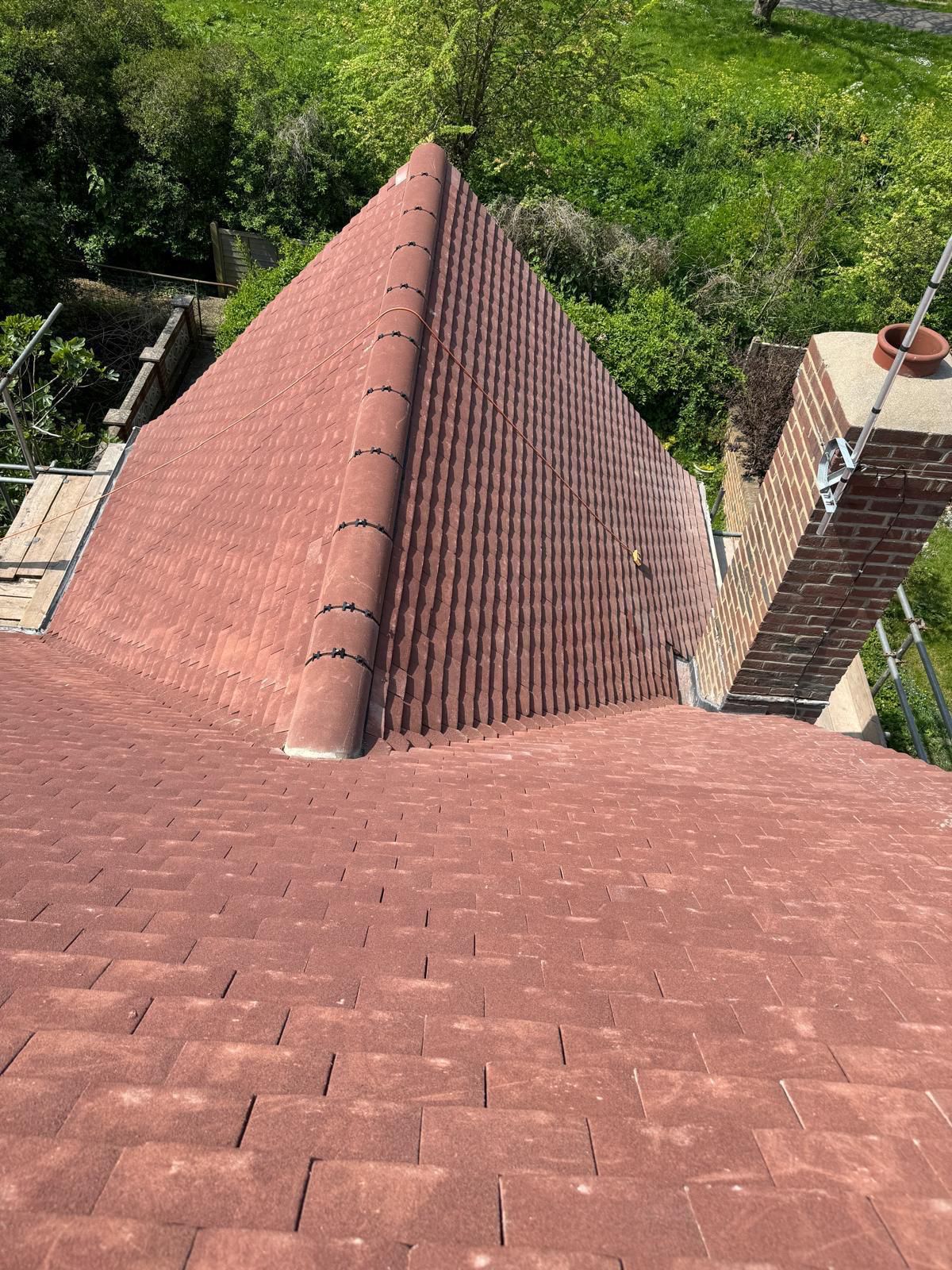 Completed red tile roof replacement