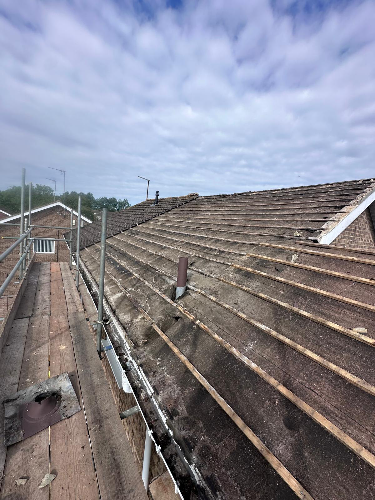 Damaged roof before repair in Slough